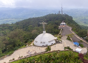 aerial of christ statue at isabel de torres mountain