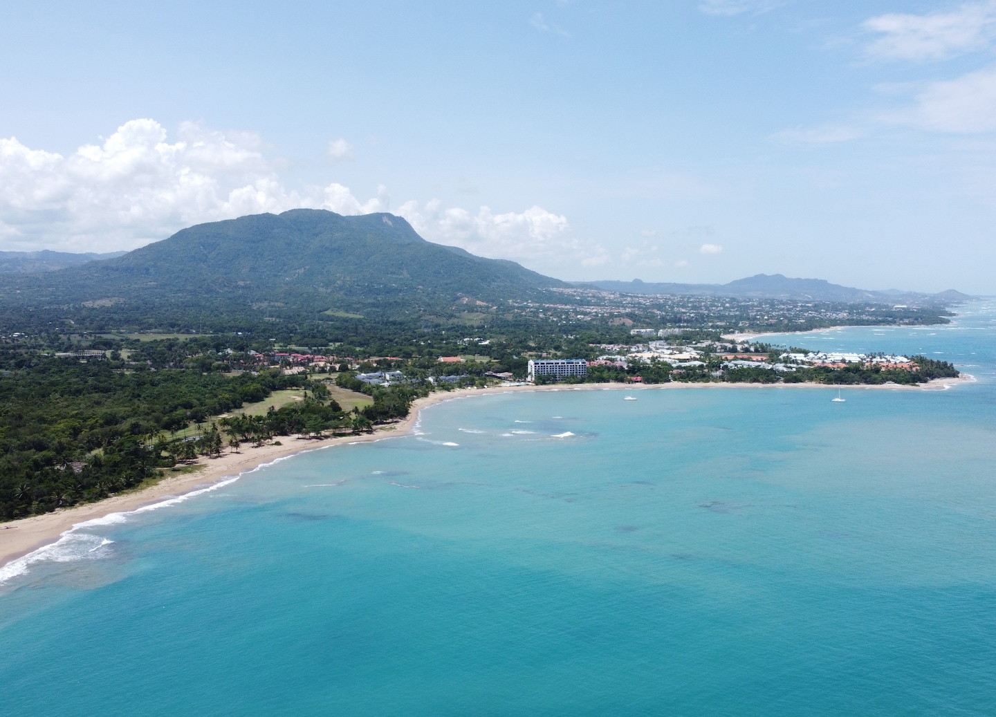 Relax at Playa Dorada with loungers, showers, a beach bar, and oceanfront dining. - Puerto Plata, Dominican Rep