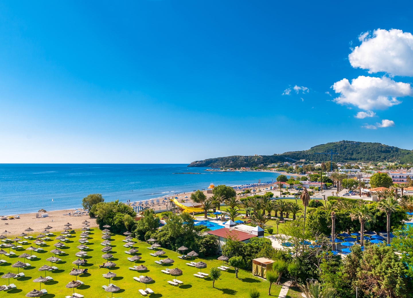 Rhodes beaches range from lively hubs to tranquil escapes, offering something for every traveler. - Rhodes, Greece