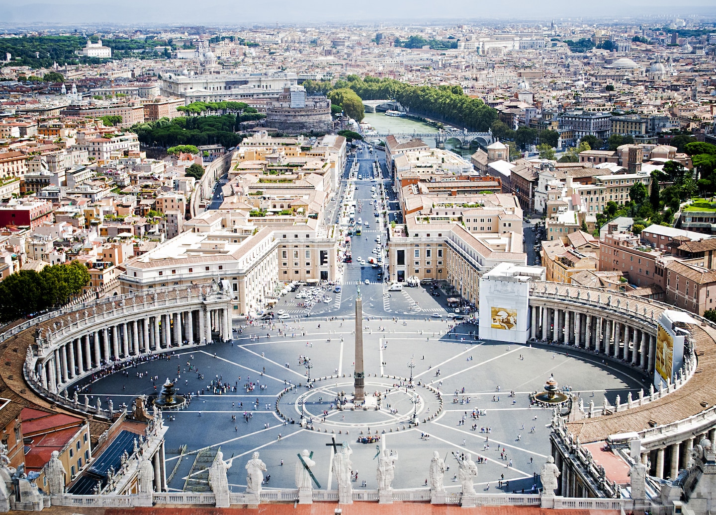 St. Peter’s Square and the Vatican unfold symmetrically from above, framed by Rome’s urban skyline. - Rome, Italy