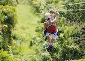 woman going on a jungle zipline adventure
