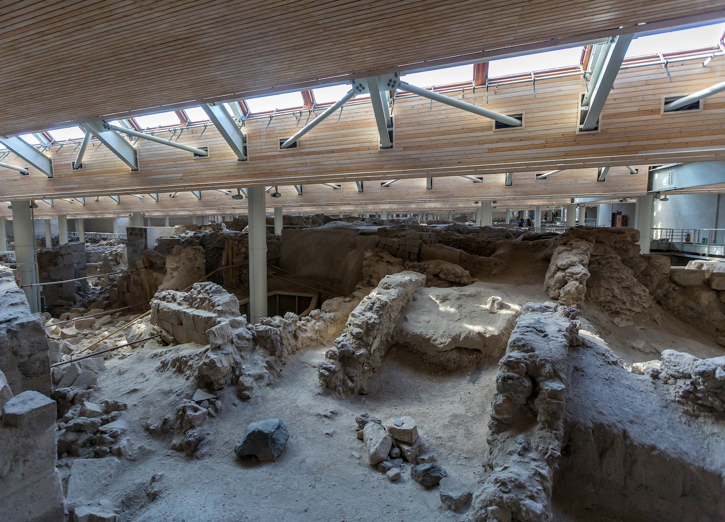 Explore Akrotiri, Santorini’s ancient Minoan city preserved in ash, showcasing Bronze Age life. - Santorini, Greece