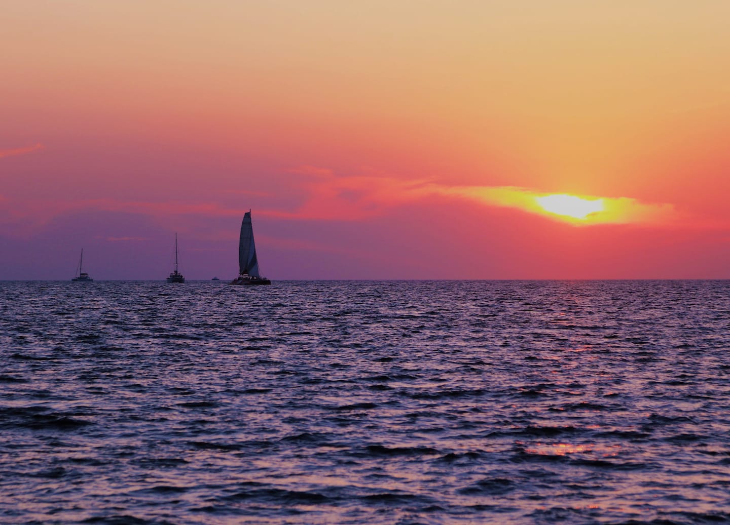 Experience Santorini’s volcanic beaches, hidden coves, and relaxing seaside moments of bliss. - Santorini, Greece