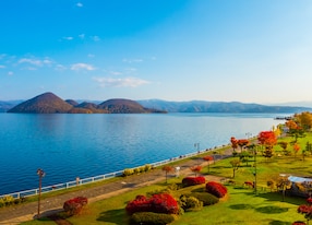 lake toya with park in foreground