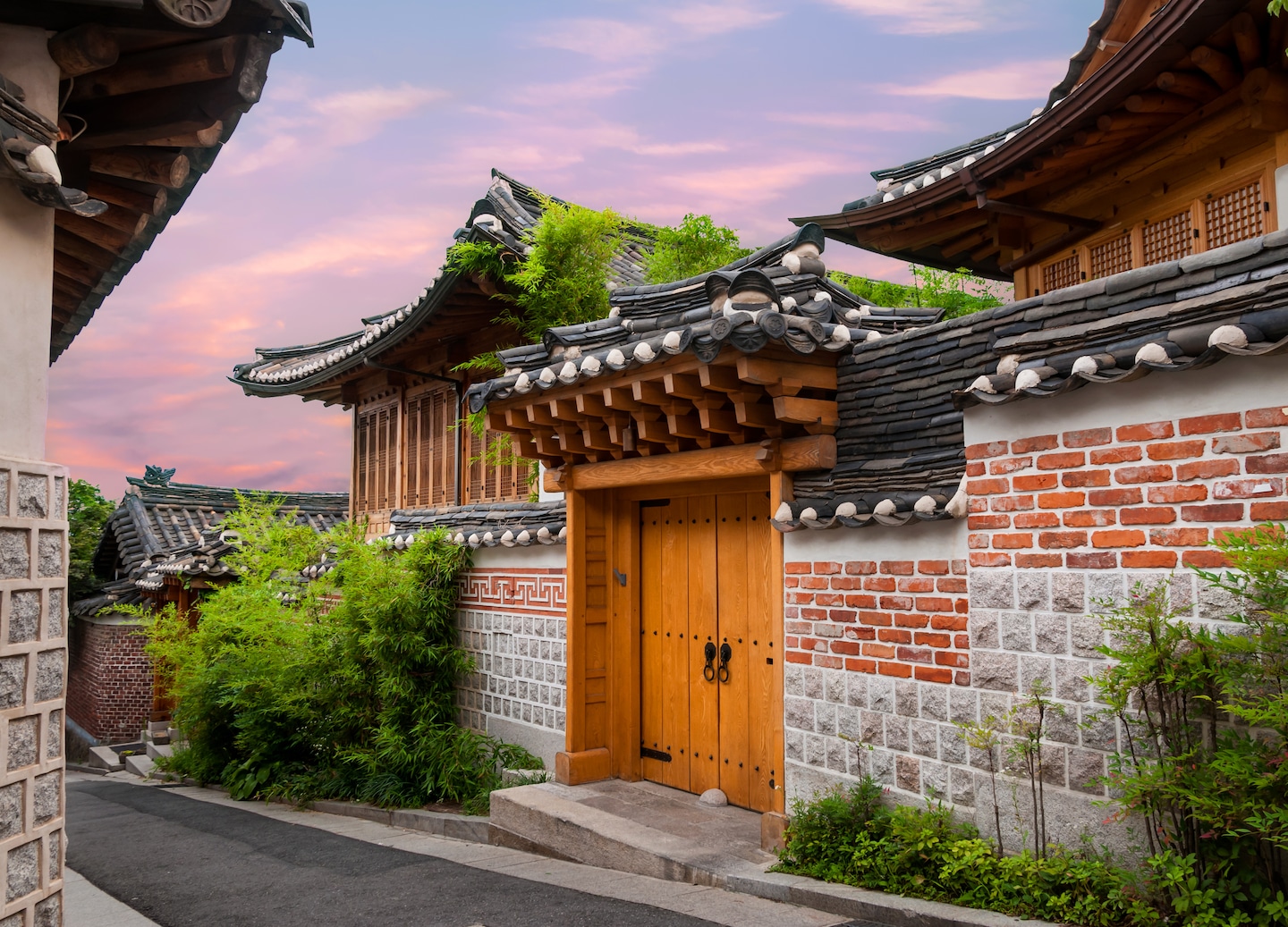 Traditional hanok homes line the streets of Bukchon Hanok Village. - Seoul, South Korea