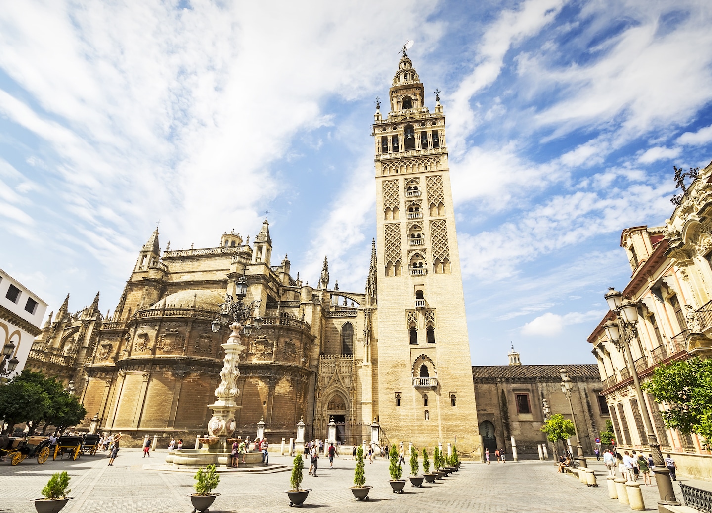 Seville Cathedral impresses with Gothic grandeur, Columbus’s tomb, and panoramic views from the Giralda tower. - Seville, Spain