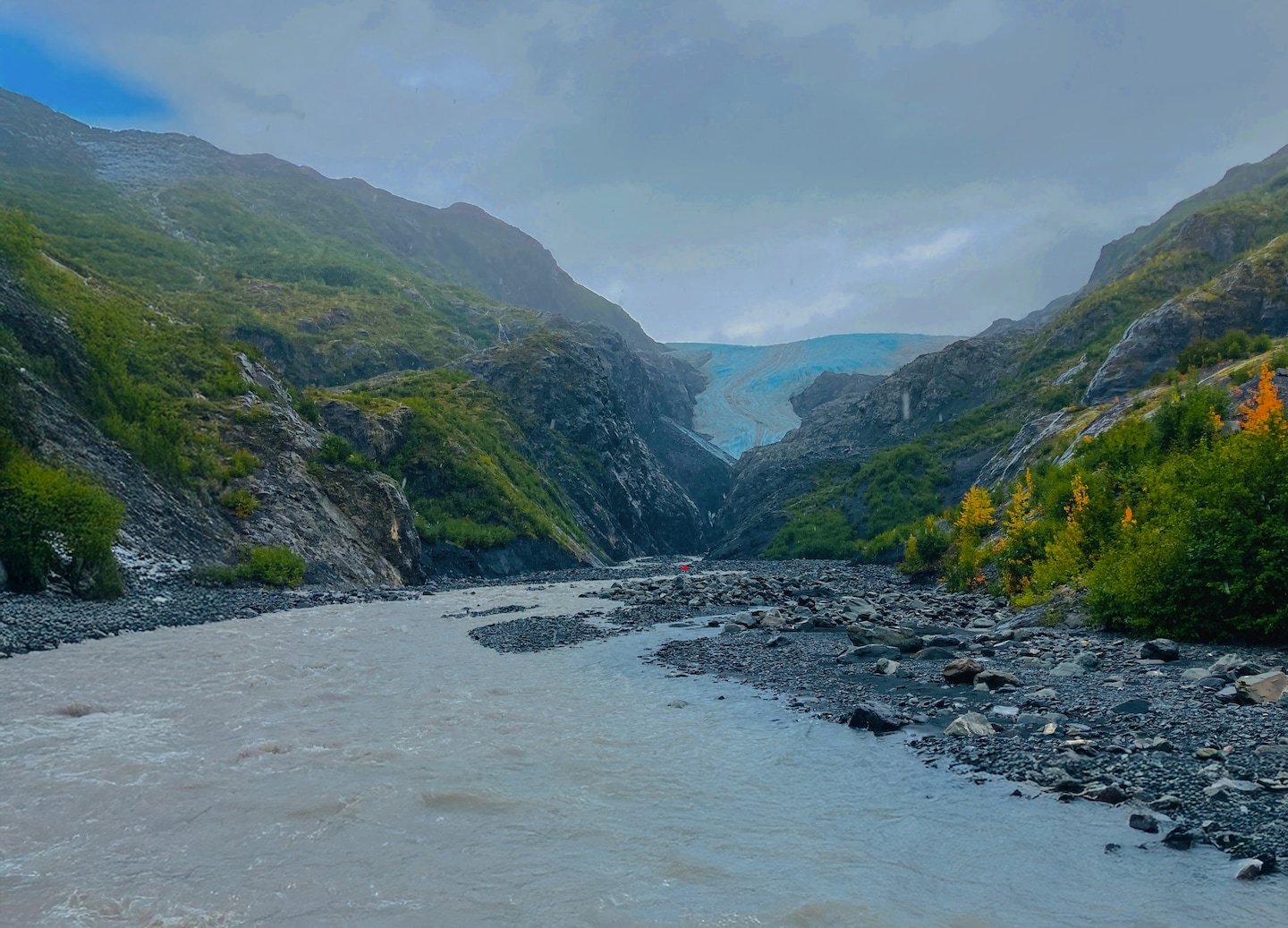 Exit Glacier meltwater river flowing through Kenai Fjords National Park landscape. - Seward, Alaska