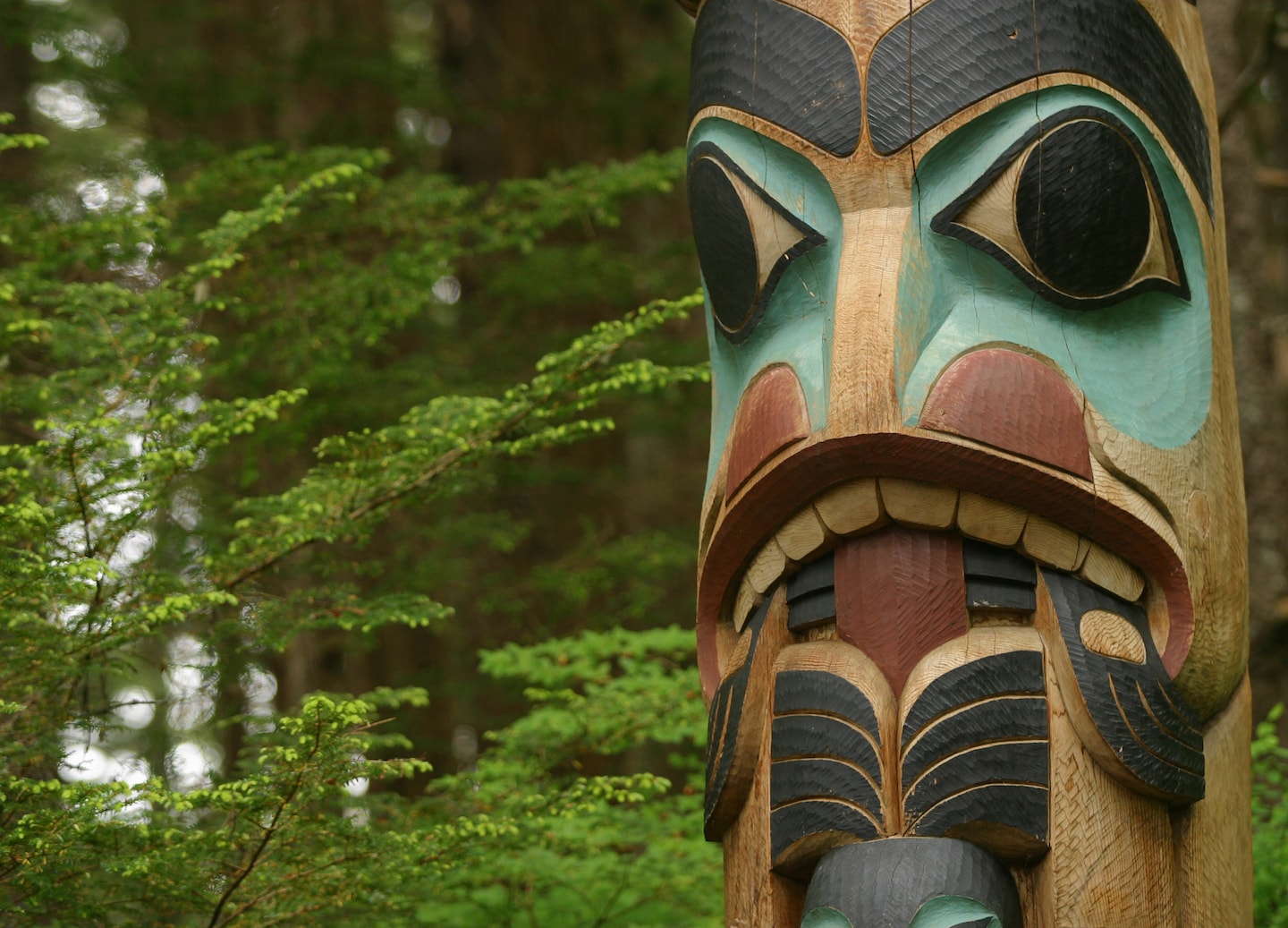 Traditional totem design on the Totem Trail. - Sitka, Alaska