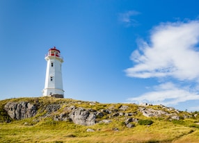 lighthouse guarding coast of sydney nova scotia