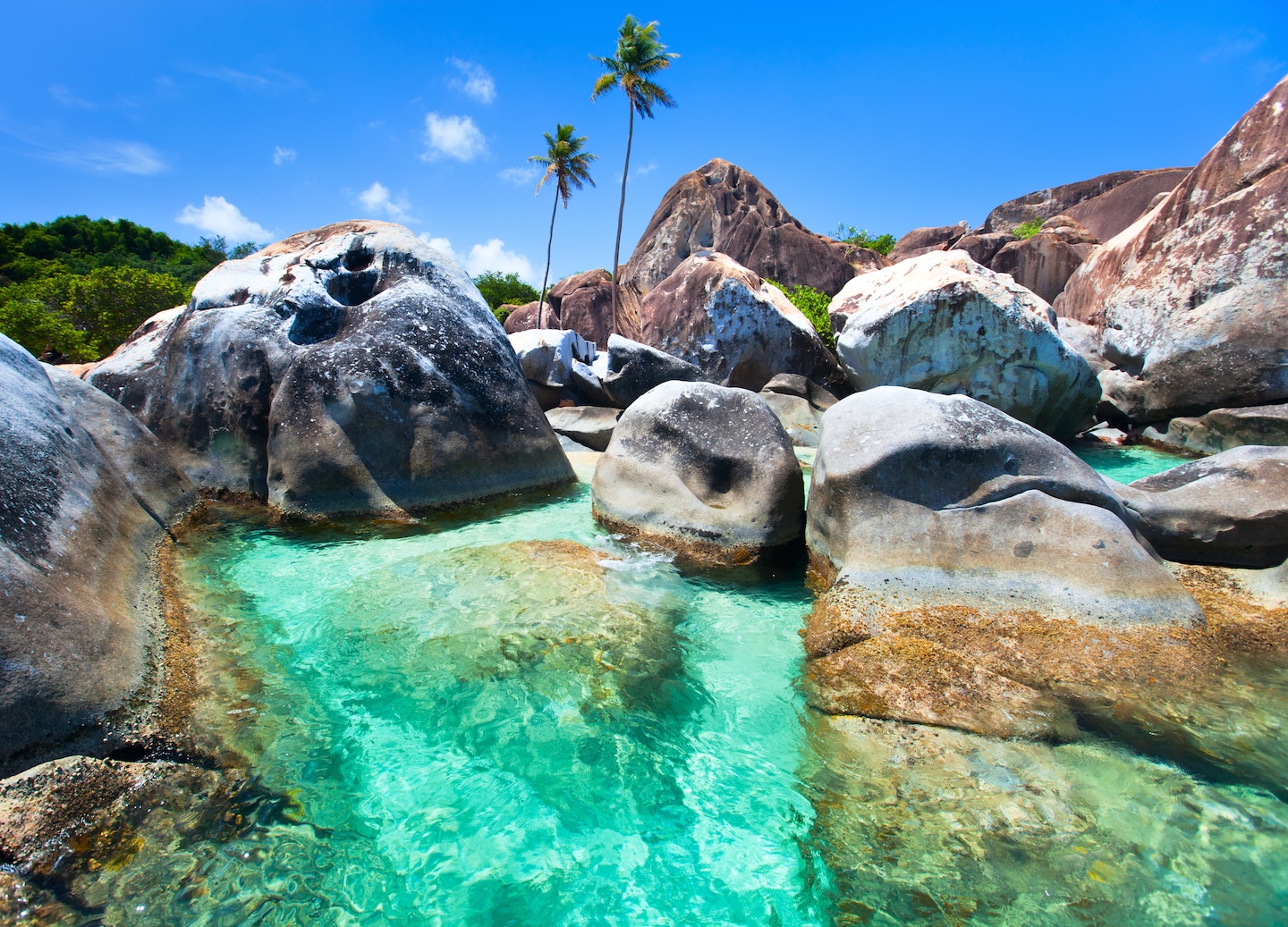 Massive boulders frame clear turquoise pools along Virgin Gorda’s iconic Baths shoreline. - Virgin Gorda, British Virgin Islands 