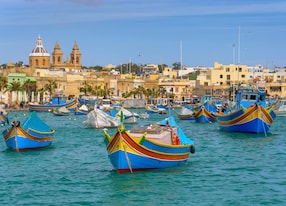 traditional fishing boats luzzu moored at marsaxlokk harbor malta