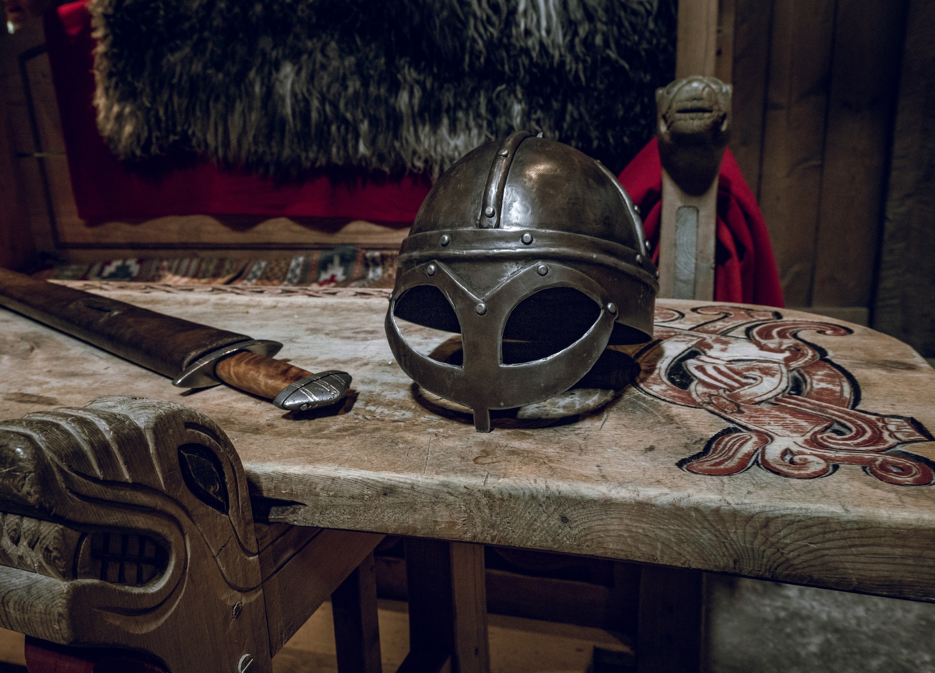 viking chair and table with viking helmet and fighting sword ancient vikings theme