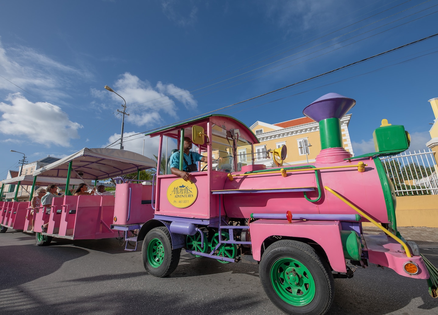 Relaxing Willemstad trolley tour showcasing iconic landmarks and views, including Queen Emma Bridge. - Willemstad, Curaçao