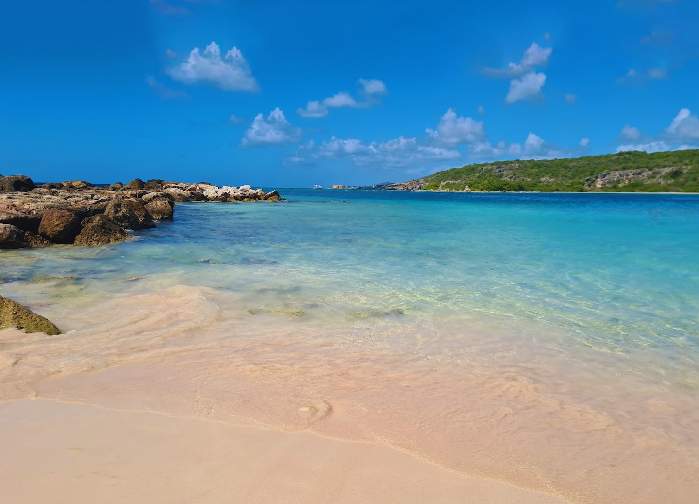 Relax on Willemstad’s peaceful beach, enjoying soft sands and serenity. - Willemstad, Curacao